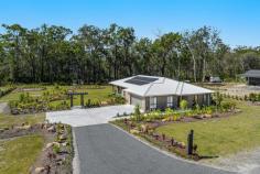24 Little Tern Court Gulmarrad NSW 2463 Introducing a thoughtfully crafted energy efficient home that embodies the principles of sustainability. Deliberate design choices have yielded an energy-efficient home that harmonises with its surroundings. Adorned with generous north-facing windows in the kitchen and main living area, this residence uses passive heating to naturally warm its interiors during the winter season. A cross breeze has been integrated, facilitating natural cooling during the summer months. Built just over a year ago, this home embraces a 6.6kw solar system, ensuring a reduced environmental footprint while offering ducted air-conditioning and heating throughout the home. Nestled upon an expansive 6942m2 lot with the privacy of a bush backdrop offering an unrivalled sense of privacy. This meticulously landscaped property features a blend of tropical foliage and fruit trees. The professionally designed landscaping leaves ample space for future additions, allowing for endless possibilities to enhance the property according to your preferences and needs. The heart of the home lies in the open plan living area enhanced by high raked ceilings, this space boasts a kitchen adorned with a large stone island bench, granite sinks and a butler's pantry. With an abundance of natural light, the open plan living area provides a strong indoor-outdoor connection. This property showcases high-end finishes of modern aesthetics with a charming coastal country ambiance. Providing ample space for all with four bedrooms and two bathrooms. Two of the bedrooms are equipped with walk-in robes and ceiling fans, ensuring comfort and convenience. The expansive master suite features an ensuite with a large vanity and shower, as well as a walk-in robe. Enjoying private scenic views of the backyard, the master suite creates a serene retreat within the home. In terms of design, finishes, and spaciousness, this home effortlessly encompasses everything. With its immaculate condition, it not only provides the fresh ambiance of a new home but also exceeds expectations by virtue of the meticulous attention to detail and diligent efforts already invested. Rest assured, all the arduous work has been expertly completed, elevating this residence to a level that surpasses the new home experience. In addition, this property boasts an array of remarkable features, including: Designed for passive solar heating, cooling and cross ventilation Ducted air-conditioning/heating throughout the home 9-foot ceilings throughout 7'8" interior doors throughout Media lounge room True butler's pantry with white double granite sink and dishwasher Entertaining area overlooking the garden setting Day and night blinds 18 Solar panels - 6.6 KW solar system Sealed driveway with concrete and turning area 8.3 x 6.2 meter shed with electricity and lights Landscape Architect master planned designed gardens with sandstone boulders. The gardens have been designed as low maintenance with a large amount of mulch Septic system is a reed bed type (no pumps) to suit 6 bedroom (for a future secondary dwelling), does not require ongoing council inspections The suburb of Gulmarrad is a fantastic lifestyle choice, with both a country and coastal feel as you are nestled between the riverside village of Maclean and the coastal havens of Brooms Head and Yamba making this the perfect lifestyle.