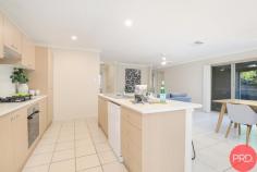 4 Port Cove Gillieston Heights NSW 2321 $600,000 to $650,000 Located in Gillieston Heights and minutes to local schools, transport, parks/playgrounds, a short drive to Greenhills Shopping Centre, the New Maitland Hospital and a thirty-minute drive to Newcastle CBD via the Hunter Expressway. Short walk to the new complex of shops that have been built at the top of the estate, including a chemist, doctor's surgery, IGA, plus more. This neat and tidy modern home is conveniently situated on a 567 sqm easy-to-maintain level block. The home's visual appeal continues inside, with a simple, modern open plan interior and soft colour scheme that ensures the rooms feel bright and spacious. A centrally located kitchen features plenty of cupboard space, a dishwasher, stainless steel gas stove, an oven, a rangehood, and a breakfast bar. All four bedrooms are perfectly positioned with large windows and built-in wardrobes, while the master bedroom offers a great-sized walk-in robe and ensuite for that added convenience. The main bathroom is centrally located between the remaining bedrooms and features a large bathtub and separate shower. Ducted a/c and stylish tiles throughout the living and high-traffic areas, with plush carpet in the bedrooms, create a cosy feel when needed. A sliding glass door in the living room provides direct access to the covered outdoor area, creating a seamless flow for alfresco dining or entertaining. This home also includes a fully fenced and secure yard large enough for kids or pets to play in without needing all your time and energy to maintain it.
