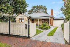 65 French St Netherby SA 5062 $1,850,000 - $1,975,000 Welcome to what may become, your new, fabulous family home. This fully renovated and extended sandstone fronted bungalow, built in the 1950's, radiates elegance and charm. Nestled on a generous 945sqm allotment, this home offers a perfect blend of vintage allure and modern amenities, perfect for you and your family. Walking through the gates of the picket fence and stepping up onto the welcoming, elevated verandah overlooking the manicured front garden, you are home. Open the front door, with its stained-glass windows, and be greeted with a stunning, wide, long entrance hall that shows off the polished timber floors which are a feature throughout the home, along with the high ceilings. You will now begin to truly appreciate just how wonderful this home really is. We offer you 4 spacious bedrooms, (or 3 bedrooms plus a bright and airy study.) The main bedroom has an ensuite, with double vanity, a walk-in robe plus built in robes. The second and third bedrooms are queen sized rooms, with the second bedroom including a built-in robe. Theses bedrooms share the large family bathroom, that features a spa bath, and is adjacent to the laundry that has an abundance of storage with floor to ceiling cabinets, plus access via the attic staircase to the ceiling space with its 12sqm of structural floor. At the end of the hallway, the home really opens as you are drawn to its heart – the expansive open plan kitchen / dining /living area. You will be impressed by the massive, stunning gourmet kitchen featuring black granite bench tops, induction cooktop and double wall ovens. It effortlessly blends classic charm with contemporary convenience and will rapidly become the place where everyone gathers to catch up on the days activities. Open the café windows above the sink, to give you direct serving access to the paved outdoor entertaining space, located under the main roof of the house. Step through the full height French doors leading off the living area and on to the patio and be seduced by the sparkling in ground pool – and there is still plenty of room for a game of back yard cricket on the lawned area. To cap all of this off, at the back of the property, extending the full 16.5m width of the block, is a 4 car garage plus a room for a full workshop or gym! Behind the 4 roller doors can store your car collection in complete safety with room to work on them in comfort (and peace). If you wanted to update the workshop / gym by adding a bathroom, easily done as plumbing is accessible and power is provided. For your daily drives, we have undercover, secure parking with the 3 car length carport offering direct access into the home. The home has solar panels installed providing approximately 7kW of power generation and you will be kept comfortable with the ducted reverse cycle air conditioning throughout. Being located near to Mitcham Primary, Unley High School, Urrbrae High School, Scotch College and Mercedes College plus a comfortable walk or very short drive to Mitcham Shopping Centre, bus and train stops, all the required amenities are taken care of. This one ticks all the boxes for those looking for a stunning home with plenty of room for all the family, an abundance of indoor and outdoor entertaining space – plus undercover and secure garaging for 7 cars!