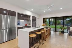 31 Dunnart Crescent Djugun WA 6725 $849,000 Beautifully positioned in family-friendly, community-focused Roebuck Estate, you'll find this spacious and stunning 4 bed, 2 bath home designed with the modern family in mind. Family-sized and feature-packed, the home delivers a modern, low-maintenance lifestyle and a seamless blend of indoor and outdoor living, perfect for the Broome way of life. From the outside, if the lush manicured lawns and mature tropical gardens don't grab your attention, the space and storage certainly will. The large double carport has room for two vehicles with plenty of additional parking available for a boat, trailer or caravan, and gated side access to the rear. Beautifully crafted and expertly executed, the home boasts spacious and stylish open-plan living and dining areas with light, bright paintwork, and abundant natural light thanks to louvre windows. The big open kitchen is guaranteed to impress, boasting feature glass splashbacks, stainless steel appliances, walk-in pantry and floating island breakfast bar with stone benchtops. Other stunning features include the gorgeous main bathroom with separate shower and bath, separate W/C, separate laundry with built-in cabinetry, feature ceiling fans, timber window blinds, plenty of storage and more. The home itself has 4 large bedrooms, all with built-in robes, air-con and ceiling fans, including the stunning Master, which boasts dual built-in robes and private ensuite Maximising indoor/outdoor living, glass sliding doors from the kitchen/living area open onto the expansive outdoor alfresco area with an outdoor sink, ideal for entertaining. The fully shaded below-ground pool is sure to be a family favourite, while the Mandi bathroom is perfect for a post-swim shower or for limiting inside access when entertaining guests. The beautifully manicured tropical gardens continue out the back with plenty of lush green grass for the kids and pets to play and a large storeroom with rollerdoor access, perfect for your tools and toys. Located in a quiet street and close to parks, shops and schools, you'll be hard pressed to find a better home and lifestyle package for your family.
