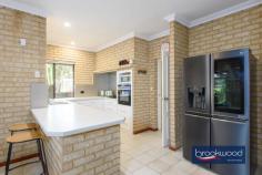 425 Walker St Mundaring WA 6073 $849,000 Nestled among towering trees, this impressive 4-bedroom, 2-bathroom home offers the perfect sanctuary for a growing family. The spacious interior boasts a master ensuite complete with a luxurious spa bath, providing a private retreat to unwind and rejuvenate. The open-plan design seamlessly connects the living, meals, and kitchen areas, creating a warm and inviting atmosphere for gatherings and quality time spent together. 4-bed, 2-bath family home 1 acre block with dual access Master ensuite with spa bath Open-plan design for seamless living Games, family and lounge rooms Large shed for storage/workshop Huge outdoor entertaining area Double garage under main roof Convenient loc near Mundaring shops There is a cosy wood burner nestled in a corner, providing a comforting ambiance during the colder months, plus a reverse cycle in wall air conditioner to service the living area. The property also boasts a games room, ideal for entertaining guests or creating a space for hobbies and recreational activities. The large shed offers ample storage space for outdoor equipment and can double as a workshop. The double garage – conveniently located under the main roof, provides secure parking and easy access to the home. The outdoor entertaining area is a true highlight, offering a sprawling space to host barbecues, relax and enjoy the serene surroundings. With dual road access, the property provides convenient entry and exit options. Additionally, the home’s prime location allows for a leisurely walk to the nearby Mundaring shops, ensuring that everyday amenities are just a stone’s throw away. In conclusion, this stunning family home seamlessly combines practicality and spacious comfort. From the tranquil setting amongst tall trees to the abundance of entertaining and living spaces, every detail has been carefully considered. This property presents an exceptional opportunity to embrace a peaceful lifestyle while still enjoying the convenience of nearby amenities. Whether spending quality time with loved ones, indulging in relaxation or pursuing hobbies, this home offers the perfect retreat to create lasting memories.