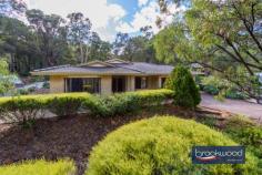 425 Walker St Mundaring WA 6073 $849,000 Nestled among towering trees, this impressive 4-bedroom, 2-bathroom home offers the perfect sanctuary for a growing family. The spacious interior boasts a master ensuite complete with a luxurious spa bath, providing a private retreat to unwind and rejuvenate. The open-plan design seamlessly connects the living, meals, and kitchen areas, creating a warm and inviting atmosphere for gatherings and quality time spent together. 4-bed, 2-bath family home 1 acre block with dual access Master ensuite with spa bath Open-plan design for seamless living Games, family and lounge rooms Large shed for storage/workshop Huge outdoor entertaining area Double garage under main roof Convenient loc near Mundaring shops There is a cosy wood burner nestled in a corner, providing a comforting ambiance during the colder months, plus a reverse cycle in wall air conditioner to service the living area. The property also boasts a games room, ideal for entertaining guests or creating a space for hobbies and recreational activities. The large shed offers ample storage space for outdoor equipment and can double as a workshop. The double garage – conveniently located under the main roof, provides secure parking and easy access to the home. The outdoor entertaining area is a true highlight, offering a sprawling space to host barbecues, relax and enjoy the serene surroundings. With dual road access, the property provides convenient entry and exit options. Additionally, the home’s prime location allows for a leisurely walk to the nearby Mundaring shops, ensuring that everyday amenities are just a stone’s throw away. In conclusion, this stunning family home seamlessly combines practicality and spacious comfort. From the tranquil setting amongst tall trees to the abundance of entertaining and living spaces, every detail has been carefully considered. This property presents an exceptional opportunity to embrace a peaceful lifestyle while still enjoying the convenience of nearby amenities. Whether spending quality time with loved ones, indulging in relaxation or pursuing hobbies, this home offers the perfect retreat to create lasting memories.