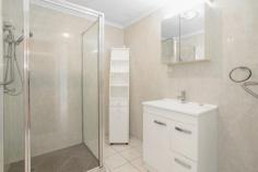 39 INVESTIGATOR STREET ANDERGROVE QLD 4740 $349,000 This lovely, neat & well-maintained property will be perfectly suited to a downsizing couple ready to retire, a first home buyer looking for a stepping-stone property, or a savvy investor looking for a wise acquisition - this property is bursting with potential. Some tasteful renovations have increased both the aesthetics and functionality of the home with a large, modern kitchen & a floor-to-ceiling tiled bathroom. The welcoming streetscape offers a double-open carport leading to the tiled front patio. Step inside to a vast open plan, fully tiled lounge, kitchen, and dining area with a large capacity split system air conditioner plus the flow of fresh air from the front windows and door to the sliding glass doors located in the dining room at the rear of this large, open space. The beautiful kitchen contains copious cabinets and drawers for storage, including a pantry cupboard, a large fridge cavity, and easy-clean laminated benchtops with tiled splashbacks. Existing appliances include the electric oven, stovetop, and range hood. Step through the sliding doors into a large covered and tiled outdoor entertaining area that runs the entire length of the house & boasts a lovely view of the greenhouse area & large, fully fenced backyard. Leading from the kitchen is the large, tiled laundry with plenty of space for appliances, including perhaps a second fridge. A real bonus to this home is the large air-conditioned rumpus room that was originally the garage but could be converted to present an array of possible functions, from a home office to a rumpus room or even a media room. The two bedrooms are carpeted, one with air conditioning and a built-in robe and ceiling fan. The second bedroom receives refreshing cross-flow ventilation thanks to the two large screened windows. The bathroom has been tastefully renovated with floor-to-ceiling tiles, a walk-in shower, single vanity, and a shaving cabinet. For privacy, there is a separate toilet. Space to park vehicles won't be a problem as the double carport is located at the front of the home but also allows side access directly to the two-bay shed that is powered and fully lockable.