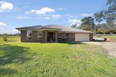 14 Creek Street Portland NSW 2847 $699,000 Modern family home designed with comfort in mind, set on a generous easy care parcel of 1.6 acres in a secluded part of Portland. The open plan kitchen, dining and lounge areas lead out onto an undercover patio that creates the ideal space to relax with family or entertain guests. The kitchen is well-appointed with ample storage space and gas cooking. You will love the four spacious bedrooms, each with built-in wardrobes and the Master boasting a walk-in closet and attached ensuite, making it the perfect retreat after a long day. Other property highlights include, a modern main bathroom that features a separate bathtub and shower, family and rumpus room to ensure there's plenty of space for everyone to spread out, a wood burner to keep you cosy and warm in the cooler months, neutral colour palette and loads of natural light throughout. Complete with a double garage for secure parking and additional storage. Located just a 2.1km to Portland's Main Street, 27.5km to Lithgow and 50.2km to Bathurst. This home has everything that you need to enjoy country living while still being able to enjoy the comforts of town.