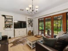 6 Dyer Court URAIDLA SA 5142 $990,000 - $1,020,000 Upon arriving at the property you are graced by a glorious autumn garden and met with the serenity of Hills lifestyle. Set on 2,107m2 (approx.) of well-maintained gardens and a native outlook from the wraparound bullnose verandah. Leadlight glass surrounds the front door when entering the home you are welcomed with a warm homely feel. Double timber doors lead to the spacious lounge room with views to the garden from the French doors, new timber floating floorboards and ornate ceiling rose. Solid timber Tasmanian Oak kitchen with electric glass cooktop, wall oven and dishwasher adjacent open family / dining room leading through French doors to outdoor verandah and large paved undercover entertaining area, perfect for family gatherings. Three generous sized bedrooms all with their own access to the bullnose verandah, main bedroom with walk-in wardrobe and ensuite. Family bathroom with separate shower, full sized bath and timber vanity, separate toilet and large laundry with ample cupboard space. The exterior grounds including a double garage with remote control door. Ducted reverse cycle air-conditioning complete the home. Key features: • Hills property surrounded by glorious gardens • Three bedrooms, main with ensuite & WIR • Tasmanian Oak kitchen with dishwasher • Spacious lounge & separate family / dining • Family bathroom with shower & bath • Double garage with remote door • Ducted reverse cycle air-conditioning