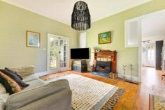 124 Old Wingello Rd Bundanoon NSW 2578 $1,495,000 Character cottage located in a quiet location with bush outlook and perfect north facing frontage ensuring year round sunshine. Lovingly restored with entertaining and family in mind, the floorplan offers both an intimate lounge with French doors to the deep side verandah and open plan living plus dining with new glamorous kitchen which also accesses the side verandah and rear enclosed BBQ deck offering an elevated view of the yard. The hub of the home is the stunning new kitchen showcasing high end finishes with stone benches, island, quality appliances and well placed Butler’s pantry and laundry room with excellent storage options with a quaint window seat also offering further storage if needed. The cottage offers 3 double beds, all with new built-ins plus a potential fourth bedroom / artist’s studio in the loft area with roof window. This space also makes for an excellent ventilated storage room. The main bath is conveniently located to service all beds and includes generous walk in shower, charming timber vanity and separate wc with hand basin. There is a quirkiness to this renovated cottage from the lined interior walls, the original floor boards, high skirtings and 12ft ceilings plus a selection of pretty stained glass and gorgeous timber windows and doors. Under floor electric heating, gas heater and slow combustion fireplace cover you for the cooler months and all town services are an added bonus. Post and rail fencing to the front with pedestrian access through the established native gardens adding to the pretty façade with space allocated for car access and shedding / garaging if required. The remainder of the yard is somewhat of a blank canvas with fenced veggie garden, possible chook house and some excellent boundary planting in place. All this within walking distance to the village shops, school, station and sporting fields.