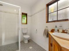 6 Dyer Court URAIDLA SA 5142 $990,000 - $1,020,000 Upon arriving at the property you are graced by a glorious autumn garden and met with the serenity of Hills lifestyle. Set on 2,107m2 (approx.) of well-maintained gardens and a native outlook from the wraparound bullnose verandah. Leadlight glass surrounds the front door when entering the home you are welcomed with a warm homely feel. Double timber doors lead to the spacious lounge room with views to the garden from the French doors, new timber floating floorboards and ornate ceiling rose. Solid timber Tasmanian Oak kitchen with electric glass cooktop, wall oven and dishwasher adjacent open family / dining room leading through French doors to outdoor verandah and large paved undercover entertaining area, perfect for family gatherings. Three generous sized bedrooms all with their own access to the bullnose verandah, main bedroom with walk-in wardrobe and ensuite. Family bathroom with separate shower, full sized bath and timber vanity, separate toilet and large laundry with ample cupboard space. The exterior grounds including a double garage with remote control door. Ducted reverse cycle air-conditioning complete the home. Key features: • Hills property surrounded by glorious gardens • Three bedrooms, main with ensuite & WIR • Tasmanian Oak kitchen with dishwasher • Spacious lounge & separate family / dining • Family bathroom with shower & bath • Double garage with remote door • Ducted reverse cycle air-conditioning