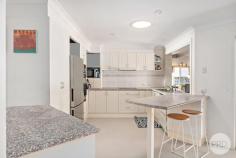 22 The Breakwater Corlette NSW 2315 Positioned in the idyllic & family friendly suburb of Corlette, this residence perfectly fuses contemporary design with an impressive sense of space and functionality to create the ultimate family home. Offering a superb street appeal, the home is enveloped by manicured lawns & gardens that are designed to welcome you from the moment you arrive. A fresh coastal colour palette with bright interiors coalesces with the abundance of natural light emanating from the numerous, cleverly positioned windows and skylight, drenching the warm timber and tile floors throughout. Encompassing three bedrooms of accommodation, with the master suite boasting a en-suite and the main bathroom services the remaining two bedrooms. There is a massive enclosed Queenslander room which would be a real entertainers dream. Outdoors, spend your days relaxing and basking in the sun by the resort style in-ground pool and a fully fenced grassed backyard. Complete with a massive double lock up garage and an additional parking space, this home has it all! Enviably located with local schools within close proximity and within approx. 3km to the iconic Nelson Bay CBD, Nelson Bay Marina and Salamander Bay Shopping Precinct, you are in the heart of it all here!