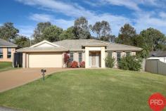 4 Port Cove Gillieston Heights NSW 2321 $600,000 to $650,000 Located in Gillieston Heights and minutes to local schools, transport, parks/playgrounds, a short drive to Greenhills Shopping Centre, the New Maitland Hospital and a thirty-minute drive to Newcastle CBD via the Hunter Expressway. Short walk to the new complex of shops that have been built at the top of the estate, including a chemist, doctor's surgery, IGA, plus more. This neat and tidy modern home is conveniently situated on a 567 sqm easy-to-maintain level block. The home's visual appeal continues inside, with a simple, modern open plan interior and soft colour scheme that ensures the rooms feel bright and spacious. A centrally located kitchen features plenty of cupboard space, a dishwasher, stainless steel gas stove, an oven, a rangehood, and a breakfast bar. All four bedrooms are perfectly positioned with large windows and built-in wardrobes, while the master bedroom offers a great-sized walk-in robe and ensuite for that added convenience. The main bathroom is centrally located between the remaining bedrooms and features a large bathtub and separate shower. Ducted a/c and stylish tiles throughout the living and high-traffic areas, with plush carpet in the bedrooms, create a cosy feel when needed. A sliding glass door in the living room provides direct access to the covered outdoor area, creating a seamless flow for alfresco dining or entertaining. This home also includes a fully fenced and secure yard large enough for kids or pets to play in without needing all your time and energy to maintain it.