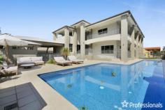 24 Midshipman Court Paradise Waters QLD 4217 $5,200,000 Welcome to 24 Midshipman Court – an architectural masterpiece that’s sure to take your breath away! Positioned on a large 792m2 allotment in prestigious Paradise Waters. If boating and housing a stable of luxury vehicles is important to you, don’t miss this unique opportunity. Nestled in a stunning waterfront location, this spectacular property has multiple living areas over two levels, huge balconies taking in the wonderful water views by day and skyline at night, there’s 4 bedrooms and 4 bathrooms, the master suite has a large walk-in robe with an office/nursery attached and modern ensuite. There’s an oversized ensuited bedroom downstairs, perfect for guests, in laws or a home office. This is an outdoor lover’s dream, with a fabulous pool for both leisure and training, the huge no maintenance entertaining area is perfect for sun lovers and there’s plenty of shaded areas when you’ve had enough. This 6 star property is complete with pontoon, jet ski dry dock and dolly ramp, boat shed, large palm tree and a private beach area for ultimate relaxation. Organise your inspection today and start living the life of your dreams! Call Kim Richards 0416 046 665 Multiple living areas with high ceilings and ducted/zoned air conditioning Beautiful wide blackbutt timber floors and staircase Water and skyline views, veranda’s front and back over all levels Modern kitchen with induction cooktop, two ovens, steam oven and plate warmer draw Master suite with walk-in-robe and retreat/office/nursery opens to wraparound balcony Bedrooms 2 and 3 have built wardrobes and access to first floor balcony with great views Four bathrooms in total, large laundry with plenty of storage Guest room/home office with ensuite and external access to service the pool area Media room upstairs has a wide balcony and fabulous skyline views Games room includes a full size pool table Basement includes 4 large car spaces, gym area and multiple storage rooms boat shed with slip and work shed Carport parking for an additional 2 cars Beautiful sun-drenched swimming pool with plenty of entertainment area 15kw solar system with 61 solar panels 12m pontoon with water and 3 phase power connected 792sqm block with concrete constructed house on 3 levels including basement Paradise Waters is a prestigious island enclave of Surfers Paradise perfectly positioned with direct ocean access via the Sundale Bridge with a clearance height of 4.5m. It’s in walking distance to Main Beach’s popular Tedder Avenue dining and shopping strip and close to waterfront shopping and fine dining of Marina Mirage. Patrolled beaches and elite schools, including St. Hilda’s School and TSS, are close by. Reach Brisbane Airport in 60 minutes or Coolangatta Airport in 30 minutes.
