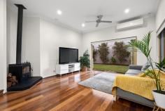 11 Gairloch St Applecross WA 6153 For those that know Applecross, you will appreciate this is the most convenient and desirable location in the suburb for families and downsizers alike. Located on a stunning Jacaranda lined street, and just a short stroll to the Applecross Village café strip, Applecross Primary School, Gairloch Reserve, bus transport and the riverfront foreshore and walkways. This timeless home boasts over 60 years of character and charm yet has been more recently renovated to be move in ready! Situated on 517 square metres of land, this single level, street front residence has a functional floor plan with timber floor boards and high ornate ceilings that give this home a lovely sense of space. The front of the home comprises a bedroom with a built-in robe and lounge area with built in gas fireplace for warmth and ambience on those cooler nights. The oversized master bedroom has plenty of space with a walk-in-robe and has its own ensuite bathroom which has been recently renovated to a high standard with double showers, double vanity and a separate w/c. The home also includes two more secondary bedrooms, central study and separate laundry. For use by those occupying the secondary bedrooms, there is an additional bathroom with a family bath and shower as well as a separate w/c. At the heart of the home is the open plan lounge with fireplace, dining and kitchen which has been renovated within more recent years. The kitchen features stone bench tops, stainless steel appliances and space for a double door refrigerator. The lounge room has plenty of space for the whole family and provides access directly onto the spacious cedar lined alfresco area, heated swimming pool and grassed area with access provided via large bifold doors. The front of the home has a new aggregate driveway with plenty of parking space or room to play basketball, easy care gardens and double lock up garage. Additional features of this stunning home include 5kW solar panels, reverse cycle air-conditioning and fans and gorgeous plantation shutters.
