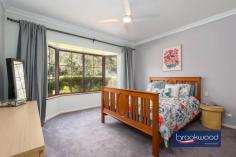 425 Walker St Mundaring WA 6073 $849,000 Nestled among towering trees, this impressive 4-bedroom, 2-bathroom home offers the perfect sanctuary for a growing family. The spacious interior boasts a master ensuite complete with a luxurious spa bath, providing a private retreat to unwind and rejuvenate. The open-plan design seamlessly connects the living, meals, and kitchen areas, creating a warm and inviting atmosphere for gatherings and quality time spent together. 4-bed, 2-bath family home 1 acre block with dual access Master ensuite with spa bath Open-plan design for seamless living Games, family and lounge rooms Large shed for storage/workshop Huge outdoor entertaining area Double garage under main roof Convenient loc near Mundaring shops There is a cosy wood burner nestled in a corner, providing a comforting ambiance during the colder months, plus a reverse cycle in wall air conditioner to service the living area. The property also boasts a games room, ideal for entertaining guests or creating a space for hobbies and recreational activities. The large shed offers ample storage space for outdoor equipment and can double as a workshop. The double garage – conveniently located under the main roof, provides secure parking and easy access to the home. The outdoor entertaining area is a true highlight, offering a sprawling space to host barbecues, relax and enjoy the serene surroundings. With dual road access, the property provides convenient entry and exit options. Additionally, the home’s prime location allows for a leisurely walk to the nearby Mundaring shops, ensuring that everyday amenities are just a stone’s throw away. In conclusion, this stunning family home seamlessly combines practicality and spacious comfort. From the tranquil setting amongst tall trees to the abundance of entertaining and living spaces, every detail has been carefully considered. This property presents an exceptional opportunity to embrace a peaceful lifestyle while still enjoying the convenience of nearby amenities. Whether spending quality time with loved ones, indulging in relaxation or pursuing hobbies, this home offers the perfect retreat to create lasting memories.