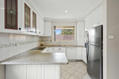 38 Dempster Street West Wollongong NSW 2500 $1,375,000 Standing proudly across 942 sqm, this charming, well-loved four-bedroom home ticks all the right boxes. Distinctively spacious and full of light, this warmly inviting residence seamlessly blends form and function with an adaptable floor plan that can easily cater to a growing family needs. Grounded in practicality, the garden level features a defined kitchen/dining zone, polished timber floors, escarpment views and three generous-sized bedrooms, including an east-facing master suite. While the lower ground floor boasts a self-contained flat complete with a kitchenette, bedroom and laundry/bathroom. There is endless renovation, investment and development potential for the astute purchaser to enjoy (STCA). Features Excellent forever-home potential across two versatile levels All main living on the garden-level with three bedrooms, spacious bathroom + ensuite Private self-contained retreat underneath complete with kitchenette, storage Well maintained kitchen, a/c units in living + master bedroom Energy-efficient solar panels Oversized double garage + carport Super-sized backyard with child friendly lawn, low maintenance garden, rainwater tank
