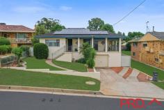 93 Wilburtree Street Tamworth NSW 2340 $749,500 An exceptional opportunity exists to secure this substantial family residence, with room to accommodate large families. This generous-sized multi-functional home has everything you have been dreaming about located on a massive 1,549 sqm block fully fenced with rear lane access! This spacious home is perfect for the entertainer or growing family, the floor plan offers 4 large bedrooms with built in robes. Upstairs, the functional kitchen flows into a dining area, perfect for family meals or entertaining guests, also with updated bathroom and ample storage. The main bedroom with ensuite is located at the rear of the home offering privacy for parents. Downstairs the floor plan offers an additional living space with walk-in storage, perfect for a media room or teenagers retreat with external access from the garage. Enjoy your morning coffee from your front verandah with mountain views across Tamworth or relax in the private alfresco area overlooking the stunning pool that has been recently upgraded with new pump, sand filter, new lines and fresh paint. The home features 7.5 kw solar panels with 10 inverters, ducted and zoned heating and cooling with touch screen on/off for individual year-round comfort in all areas of the home. Other bonuses include loads of shedding with 4 carports, secure lock up remote car accommodation with internal access to the home with x2 remote doors with drive through back yard access plus rear lane access to the property- perfect to store your caravan or boat! Located in the central suburb of Hillvue, close to shops, cafes, schools, transport and packs and 5kms to the CBD of Tamworth. This property is a rare opportunity offering a massive family home, huge block, stacks of shedding and a stunning pool. Don't miss this one....!!