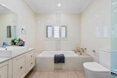 8 Macken Street Oatley NSW 2223 $2,490,000 Nestled in one of Oatley's most sought after and quiet streets this beautifully renovated full brick family home sits on 695 m2 with a desirable low maintenance north facing yard.. This spacious double brick home boasts multiple living spaces, a versatile layout and well-kept interiors. Set on the high side of the street with landscaped gardens, the property captures great natural light throughout the home. Only moments to the Georges River waterway, this property is an easy walk to Oatley Village, local schools and train station. Property features: Combined lounge and dining area that flows to a large undercover entertaining area. Four spacious bedrooms with floor to ceiling wardrobe Master bedroom with ensuite bathroom. Main bathroom with separate bath and shower. Bright kitchen with stone benchtops, oven, dishwasher as well as ample storage. Internal laundry with external access. Lock up the garage with ample space for storage. Lush backyard with with multiple seating areas