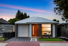 45A Thomas St South Plympton SA 5038 $835,000 - $875,000 This stunning modern Torrens Title home is perfectly situated in the sought-after neighbourhood of South Plympton. With its contemporary design and thoughtful layout, this property offers a stylish and comfortable living experience. As you step inside, you'll notice the master bedroom, located at the front of the home. This spacious room features an ensuite and walk-in robe, providing ample storage space. A second living area, which adds versatility and additional space for various activities. Whether you need a family room, home office, or entertainment area, this flexible living space caters to your specific needs. At the back of the home, you'll find the open plan living area, where modern design meets functionality. The contemporary kitchen is equipped with sleek fixtures and appliances. The kitchen seamlessly flows into the dining area and lounge, creating a spacious and welcoming atmosphere for entertaining guests. Connecting with the outdoor alfresco area and rear yard. This allows for easy indoor-outdoor transition and provides a perfect setting for outdoor dining, relaxation, and enjoying the fresh air. The second and third well-sized bedrooms with built in robes are serviced by the main three-way bathroom. Offering separate areas for the vanity, toilet, and bathing facilities. A separate laundry adds convenience to your daily routine, providing ample storage with linen cupboards also in the hallway. The home also contains reverse cycle air conditioning for all year-round comfort, a security system for peace of mind and watering system in the garden. The single garage with automatic roller door access offers secure parking for your vehicle and rear yard access via a manual roller door. Located in the desirable South Plympton area, this modern courtyard home offers easy access to amenities, schools, parks, and transportation options. Embrace a contemporary and comfortable lifestyle in this exceptional property.