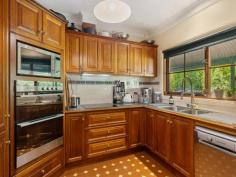 6 Dyer Court URAIDLA SA 5142 $990,000 - $1,020,000 Upon arriving at the property you are graced by a glorious autumn garden and met with the serenity of Hills lifestyle. Set on 2,107m2 (approx.) of well-maintained gardens and a native outlook from the wraparound bullnose verandah. Leadlight glass surrounds the front door when entering the home you are welcomed with a warm homely feel. Double timber doors lead to the spacious lounge room with views to the garden from the French doors, new timber floating floorboards and ornate ceiling rose. Solid timber Tasmanian Oak kitchen with electric glass cooktop, wall oven and dishwasher adjacent open family / dining room leading through French doors to outdoor verandah and large paved undercover entertaining area, perfect for family gatherings. Three generous sized bedrooms all with their own access to the bullnose verandah, main bedroom with walk-in wardrobe and ensuite. Family bathroom with separate shower, full sized bath and timber vanity, separate toilet and large laundry with ample cupboard space. The exterior grounds including a double garage with remote control door. Ducted reverse cycle air-conditioning complete the home. Key features: • Hills property surrounded by glorious gardens • Three bedrooms, main with ensuite & WIR • Tasmanian Oak kitchen with dishwasher • Spacious lounge & separate family / dining • Family bathroom with shower & bath • Double garage with remote door • Ducted reverse cycle air-conditioning