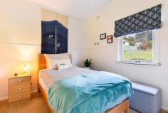 15 William St Bundanoon NSW 2578 $895,000 Charming, compact cottage with a touch of quirky 1960s, set in a highly sought after location, the gorgeous bank of windows to the north ensure the living, dining and kitchen space is bathed in natural light. The deep front deck off the entry offers extra living / entertaining in the warmer months. A gorgeous property at a great price in the village of Bundanoon. High points Excellent northern aspect ensuring a warm sun filled home via the Magnetite retrofit double glazing system The quaint kitchen has been fully renovated with space saver dishwasher, stone benches and breakfast bar The main bath has also been fully renovated with shower, wc and timber vanity plus the laundry offers a second wc A very flexible floorplan, currently configured as a two bedroom residence but the 3rd utilities room would make a great work from home space, guest accommodation or artist’s studio Adding to the charm of the cottage are the high raked ceilings on entry and throughout the living, dining and kitchen space which also offers rear access to the paved terrace area perfect for further entertaining and BBQing Externally the home offers a free standing near new garden shed, plus smaller storage / bike shed and relatively good fencing, with a single carport to the front and plenty of off street parking Heating and cooling is via the gas ducted heater + split system a/c and further enhanced via the double glazed windows, new roof and insulation The park like grounds are low maintenance with sweeping lawn areas, hedging, some garden beds and planting to the streetscape ensuring further privacy Fabulous location offering an easy stroll to the village and all it has to offer