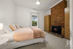 62 Last Street Beechworth VIC 3747 $920,000 - $940,000 If you've ever dreamed of owning a beautifully renovated period-style home in Beechworth, then look no further than 62 Last Street. As you step inside, you'll be greeted with its long, wide arched hallway and high ceilings. Throughout the home, you'll find new carpets that add a touch of elegance, and fresh paint that breathes new life into every corner. A formal lounge boasts an ornate cast iron fireplace and mantle. Beautiful bay windows adorned with floor-to-ceiling window furnishings allow natural light to flood the space. Additionally, there's an expansive open-plan living and dining area that perfectly complements the rear of the home. The kitchen itself is a delight, filled with natural light and a spacious layout. It features timber benchtops, gas cooking, dishwasher with a convenient central island. Experience year-round comfort in this delightful home. Both living zones are equipped with split systems, ensuring a pleasant environment throughout. All three generously sized bedrooms are fitted with their own split systems, two with BIRs, offering ample space for a growing family and individual comfort preferences. The master bedroom exudes warmth and charm with an inviting wood heater and pressed metal ceiling, creating a cosy atmosphere. Indulge in the luxury of the freshly renovated central bathroom, complete with floor heating, deep bath and walk-in shower, ensuring a blissful retreat during the colder months. There is a convenient separate toilet. A spacious laundry is accessed from the rear and includes a second shower and toilet. Step onto the rear veranda and you'll find a paved outdoor entertaining area, complemented by deciduous vines that provide year-round appeal and shade. The low-maintenance garden is adorned with vibrant plantings of birch, ornamental pear, roses, and more. The raised vegetable beds are tucked away, offering plenty of space for the kids to play in the expansive backyard complete with a cubby house. This is a home that seamlessly combines the best of classic and contemporary living. It is conveniently located within close proximity to schools, health facilities, nature reserves, and the central shopping precinct.