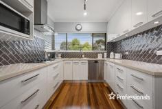 550 Queen Street Albury NSW 2640 This beautifully appointed and updated double storey family home offers fine family living and is situated in the tightly held and sought-after Queen Street. Only a short distance from the CBD and all of Albury’s main amenities including shopping centres, clubs, medical centres, and schools. Positioned to capture and enjoy the views of the beautiful surrounding landscape, the owners have spared no expense in updating this lovely family home, with quality workmanship, fixtures, and fittings throughout. ON OFFER INSIDE: – A great master suite with an impressively updated ensuite and floor to ceiling tiling. – The two remaining bedrooms upstairs have built-in robes and a beautiful outlook. – Large formal living zone which opens to the outside balcony. – Ducted cooling and heating throughout, ensuring your year-round comfort. – Top of the range beautifully updated kitchen with stone benchtops, a gas cooker and stainless-steel dishwasher, plus an abundance of both drawer and cupboard storage. – Spacious meals area adjacent to the kitchen which opens to the lovely outdoor entertaining area. – Fully updated family bathroom with full cast iron bath and floor to ceiling tiling. – Lovely décor throughout and quality window coverings, flooring, architraves, and skirting boards. – A large downstairs retreat including study area or multi-purpose room, separate toilet & 6.9 x 4m workshop. ON OFFER OUTSIDE: – At the front of the home features a balcony with city views. – Off the meals area, step out via sliding doors to a fabulous, spacious, undercover entertaining area, running approx 10.1 x 4.9m, the perfect space for entertaining. – Outdoor cabana with bar and luxurious spa adjacent to the entertaining area. – Immaculate gardens with hedges, citrus trees and secure yard. – Elevated fire pit offering breathtaking views over Albury and surrounding hills. – Double garage with panel-lift door and internal access with enough room to store 3 cars. – An external toilet to the bottom of the property. 550 Queen Street is certainly a beautifully appointed and feature-packed family home with all the hard work done, set on a low maintenance block, in a highly desirable location, only minutes from the heart of Albury.