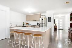25 Whistler Concourse Bandiana VIC 3691 $635,000 25 Whistler Concourse, Bandiana, is a stunning property located in the heart of the Albury-Wodonga region in Victoria. This beautiful home is perfect for those who appreciate family living, with every detail thoughtfully designed to create a stylish and comfortable space. Upon arrival, you will be greeted by a bright and spacious entrance, leading into the open-plan kitchen and dining area that exudes warmth and a sense of welcome. The two living areas make it perfect for keeping the kids in their area and closing the door on the mess and noise. The home boasts four bedrooms, each with its unique style. The master suite is particularly impressive, featuring an ensuite bathroom, a walk-in wardrobe, and a private outlook over the rear garden. The remaining three bedrooms are also spacious and well-appointed, with plenty of storage and natural light. The kitchen is central to the home, with room for a large dining table, a walk-in pantry, and ample storage space. It also features a large island bench, perfect for preparing meals and entertaining guests. The gardens have recently been replanted, with a range of flowering plants and low-maintenance ground cover. The outdoor entertaining area is located off the kitchen and dining room and is perfect for hosting friends and family. Beautiful hills surround the area and can be seen from the front or rear of the home. Other notable features of this property include a double garage, ducted heating and cooling, a continuous flow hot water system and a garden shed. Located in the peaceful neighbourhood of Bandiana, this property offers easy access to a range of amenities, including schools, shops, and parks. It is also just a short drive from both Albury or Wodonga CBD, offering a wide range of entertainment, dining, and leisure options. 25 Whistler Concourse, Bandiana, is an exceptional property that offers a perfect blend of comfort and style. It is an ideal choice for those looking for a great family home or an investment.