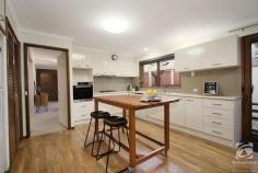 8 Heidelberg Drive Wodonga VIC 3690 $629,000 Welcome to 8 Heidelberg Drive, a beautiful property situated in the heart of Wodonga. With a generous block size measuring in at an impressive 1196m2, this ample space provides plenty of room for outdoor activities, gardening, and relaxation, allowing you to create your own personal oasis. The house itself boasts four spacious bedrooms, all equipped with built-in robes, and two well-appointed bathrooms providing convenience and privacy. Located at the front of the home, you will find the main bedroom, ensuite, formal lounge and study, creating a master suite. The kitchen underwent renovation in 2011, ensuring a modern and functional space for culinary endeavours. The well-designed open plan kitchen, living and dining area truly is the heart of the home. To keep you comfortable throughout the seasons, this home features ducted evaporative cooling, and on cooler days, you can cozy up in the living areas with the wood-look gas heater at one end of the house or the wood heater at the other, creating a warm and inviting atmosphere. For car enthusiasts or those in need of additional storage, this property offers a double carport with a roller door, ensuring secure parking for your vehicles. Furthermore, a double oversized garage with a rumpus room off the alfresco area provides even more space for storage, hobbies, or a play area for the kids. In terms of sustainability, this property is equipped with solar panels, reducing your energy consumption. A water tank, gravity-fed to the gardens, further enhances the property's eco-friendly features while helping to maintain a lush and vibrant outdoor space. For those with a green thumb, this property includes a vegetable garden where you can grow your own fresh produce and enjoy fresh eggs straight from your backyard with the existing chook house, just waiting for a new flock. Additionally, a cubby house and garden shed provide additional storage options and endless possibilities for outdoor activities. Overall, 8 Heidelberg Drive presents an ideal family home, blending comfort and functionality.