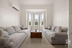62 Last Street Beechworth VIC 3747 $920,000 - $940,000 If you've ever dreamed of owning a beautifully renovated period-style home in Beechworth, then look no further than 62 Last Street. As you step inside, you'll be greeted with its long, wide arched hallway and high ceilings. Throughout the home, you'll find new carpets that add a touch of elegance, and fresh paint that breathes new life into every corner. A formal lounge boasts an ornate cast iron fireplace and mantle. Beautiful bay windows adorned with floor-to-ceiling window furnishings allow natural light to flood the space. Additionally, there's an expansive open-plan living and dining area that perfectly complements the rear of the home. The kitchen itself is a delight, filled with natural light and a spacious layout. It features timber benchtops, gas cooking, dishwasher with a convenient central island. Experience year-round comfort in this delightful home. Both living zones are equipped with split systems, ensuring a pleasant environment throughout. All three generously sized bedrooms are fitted with their own split systems, two with BIRs, offering ample space for a growing family and individual comfort preferences. The master bedroom exudes warmth and charm with an inviting wood heater and pressed metal ceiling, creating a cosy atmosphere. Indulge in the luxury of the freshly renovated central bathroom, complete with floor heating, deep bath and walk-in shower, ensuring a blissful retreat during the colder months. There is a convenient separate toilet. A spacious laundry is accessed from the rear and includes a second shower and toilet. Step onto the rear veranda and you'll find a paved outdoor entertaining area, complemented by deciduous vines that provide year-round appeal and shade. The low-maintenance garden is adorned with vibrant plantings of birch, ornamental pear, roses, and more. The raised vegetable beds are tucked away, offering plenty of space for the kids to play in the expansive backyard complete with a cubby house. This is a home that seamlessly combines the best of classic and contemporary living. It is conveniently located within close proximity to schools, health facilities, nature reserves, and the central shopping precinct.