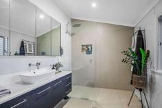 17 Carew Street Nundah QLD 4012 Behind the picket fence, this postcard-pretty home has been extended and fully renovated to create the perfect family home. With nothing more to do, 17 Carew St is ready for keen buyers to take advantage of this rare opportunity to purchase in the heart of Nundah. Situated in a quiet residential street just 100 metres from pedestrian access to Kalinga Park & Kedron Brook, 17 Carew St is 7 kilometres from Brisbane CBD. Bordered by hectares of parkland and sporting fields, this sought after pocket is known for its' wide tree-lined streets, quality homes and family friendly community. Traditional features of high ceilings, wide timber flooring & french doors are showcased beautifully in this stylish renovation. A sleek family kitchen, open plan living space and rear entertaining deck provide for modern family living. Currently utilised as a 3 bedroom home, the media room will comfortably convert to a 4th bedroom if required. Outside, shady poincianas, neatly clipped lawns & a paved barbecue space allow for casual entertaining & busy children's play in this fully fenced property, perfectly suited to Brisbane's outdoor lifestyle. Features Include: Preferred Northerly aspect Corner lot with wide frontage Open plan living & dining space Kitchen with stone benchtop, dishwasher & freestanding oven Rear covered entertaining deck with bi-fold windows to kitchen servery Media Room/4th bedroom Main bedroom with walk in robe & ensuite Additional bedrooms with built ins Family bathroom High ceilings, Vj's & wide timber flooring Crimesh & insect screens Air conditioning & ceiling fans Solar panels - 5kw Generous storage throughout Secure multi-purpose space below Low maintenance garden with mature trees Carport plus additional off-street parking 100m to Kedron Brook & Kalinga Park Walking & bike paths, playgrounds & sporting fields Walk to Nundah rail or local bus services Short drive to Airport Link Tunnel System & Brisbane Airports Gateway Arterial link to Gold & Sunshine coasts close by Nundah State School & Wavell State High School Catchment Well located to a range of quality Private Schools 7km to Brisbane CBD Land 493sqm, fully fenced The home is an easy stroll to Nundah Village shops, cafes & restaurants whilst nearby, regular bus & rail services provide fast commutes to the CBD & suburbs throughout the city. With Airportlink Tunnel System, Brisbane Airport & Gateway arterial all close by, this property is perfectly positioned for convenient movement across the city and beyond.