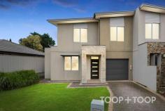 4B Wilga St Seacombe Gardens SA 5047 With two levels, up to three bedrooms, multiple living zones, lock-up garage and a secure rear yard, this contemporary townhouse epitomises the art of low-care living, offering a flexible footprint that knows exactly how to tread lightly on your daily comings and goings. Lock up, leave and love a home that makes the master the sole bedroom on a lower floor that reveals an open-plan rear, making the upper floor a luxury to call on only if and when you need to - the answer for professional couples, young families or downsizers who have the grandkids for sleepovers. Nestled in the heart of Seacombe Gardens, this move-in ready home finds itself in good company - just a hop away from Westfield Marion, for when retail therapy is in order, and a pause from the metro coast when a day at the beach is just the cure. Not just a home. A lifestyle you can really get used to. Features to love: • Modern living on an ultra-low-care parcel • Super-functional kitchen with dishwasher and gas cooktop • Storage galore, including built-in robes to all bedrooms • Upper-level retreat • Two bathrooms - one on each level • Ducted temperature control for year-round comfort • Hard-wearing tile floors to main living zone • Bright and airy with neutral colour scheme • Spacious and secure rear yard • Lock-up garage and further off-street parking in front • Zoned for Seaview High School • Close proximity to Flinders University and Flinders Hospital • Walking distance from parks/reserves and public transport • Just a 10-minute drive from the beach (Seacliff) • A 10-minute walk from Westfield Marion