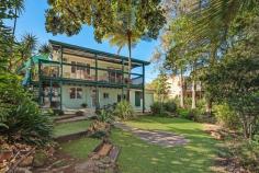 68 TAMARIND STREET MALENY QLD 4552 This cosy and unique home, within a minutes' walk to the vibrant main street of Maleny, was the original 1947 Witta Sawmill Manager's home. Over time, its property owners have all lovingly cared for this property steeped in local history, including extensions and renovations to accommodate modern living. Offering a warm and cosy feel, the home offers two good-sized bedrooms on the top level and an open plan area downstairs with its own kitchenette, bathroom, living area, covered patio and separate entrance; a rare find indeed. The kitchen and dining space provides a central focus in the home with a wonderful view over the lush, mature gardens and connection to the covered timber deck where gathering with family and friends will be a delight. The current master also offers access through sliding doors to the deck. The Sawmill Manager's House is ready for its new owners to bring their creativity and style and make this home their own for many years to come. It would also perfectly suit the accommodation market or the long-term rental market. • Original 1947 Witta Sawmill Manager's home • Extended and renovated to accommodate modern family living • 2 bedrooms upstairs and a family bathroom with tub • Downstairs offers an open plan space with kitchenette and bathroom • Cosy living room with timber burning fireplace • Good sized kitchen and dining area • Covered timber deck running the length of the rear of the home • Outlook is over mature gardens • 8-minute walk to the main street of Maleny and its unique shopping, cafes, markets, schools, public transport connections and amenities • Mature garden with plantings of rare native species and boasting numerous edible offerings; Banana, Pawpaw, Davidson Plum and bountiful citrus• Solar hot water • Single lock up garage with internal access