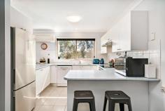 2/9 The Peninsula Corlette NSW 2315 Positioned approx. 180 meters away from the sandy shores of Corlette Beach, the allure of seaside living is seamlessly blended with convenience and tranquility in this remarkable residence. As you ascend to the top floor, stunning water views paint a breathtaking backdrop that captures the essence of coastal beauty plus having the reserve bushland at the rear. The balcony, an extension of the living space, is tailor-made for entertaining guests under open skies. Inside, the home reveals its spaciousness with two distinct living areas, allowing for seamless separation of activities and to ensure that you can comfortably accommodate all of your guests. Inside, the home reveals its spacious soul with two separate living areas, each offering its own unique atmosphere. Accommodation is comprised of three bedrooms, adorned with built-in wardrobes, to combine comfort and practicality effortlessly. The oversized main bedroom boasts an ensuite bathroom, a private sanctuary that adds a touch of luxury to everyday living. The main bathroom, spacious and illuminated by natural light, provides a refreshing retreat. Stay cozy in all seasons thanks to the convenience of split air conditioning, allowing you to tailor the indoor climate to your preference. The original kitchen, complete with a welcoming breakfast bar, reflects the charm of the home while offering a central hub for culinary creations. In this home, the coastal lifestyle is not only embraced but elevated. With its proximity to the beach, thoughtful design for entertaining and relaxation, and a host of features designed for comfort, this residence encapsulates the essence of seaside living at its finest. Step into the low-maintenance backyard, a serene oasis that invites relaxation without the fuss. The outdoor area, a haven for both social gatherings and peaceful moments with a book, offers a perfect balance of function and solace. Located just a short distance from the beach, this home offers the best of coastal living. Enjoy the soothing sound of waves and the refreshing sea breeze, making every day feel like a vacation.