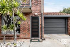 1/3 Cassie Street Collinswood SA 5081 $440,000 Nestled between the popular shopping and restaurant strips in Prospect and Walkerville this c.1976 brick townhouse is situated in the small and often unheard-of suburb of Collinswood. Just 6 kilometres from Adelaide CBD the lifestyle on offer with the purchase of this townhouse will appeal to first home buyers, savvy investors, and downsizers. The first townhouse in the strata group of three means street frontage, northern light and two entrances – one to the open plan living room and one to the sizeable private courtyard. Ideally sized the living and dining room is a blank canvas with tasteful neutral décor. Larger than expected the kitchen is well-equipped with stainless steel appliances including dishwasher and gas cooktop while also featuring a double sink, fridge and microwave alcoves and adequate storage. The powder room is easily accessible by guests while the laundry is tucked out of the way with external access to the carport and private courtyard. Large enough to host family and friends the courtyard space has a grass patch, area for dining setting and clothesline. Upstairs two double bedrooms both feature storage space with bedroom one oversized boasting a balcony access via sliding glass doors and walk-in robe. Both bedrooms are serviced by the gorgeous modern bathroom with floor to ceiling tiles, walk-in shower, bathtub, toilet, and large vanity. Further features to note include; – Three air conditioner wall units, two of which are reverse cycle – Abundance of storage throughout – Tastefully maintained over the years both internally and externally – No carpeted floors, a bonus for allergy-sufferers – Low maintenance front garden and private courtyard – Currently leased at $450 per week A two-minute walk leads you to Collinswood Shopping Centre with supermarket, chemist, bakery and florist, while a number of restaurants and eateries including Yolk Café and Walkers Arms Hotel are also moments away. Public transport is a breeze to use and commute to Adelaide CBD within 15 minutes. This townhouse is zoned to Walkerville Primary School, Nailsworth Primary School, Adelaide Botanic High School and Adelaide High School.
