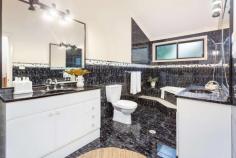 1/2A Tanner Place Kiama NSW 2533 $899,000 - $960,000 Whether you want to enjoy a relaxed sea change lifestyle, with all the benefits the local amenities and services have to offer you, and are at your fingertips, you'll appreciate this ideally situated property. You will be able to easily stroll less than 1km to the beach, as well as the shops, the restaurants and the friendly country hotels and clubs. Whatever you want and need for a happy lifestyle is right at your door. Whether you want to meditate, shop, surf, play tennis or socialize at your local club, the choice is yours. Schools, both public and private, childcare, gyms and more are here for your convenience and enjoyment. So is the NBN if you want to work or play from home. Relish the beautiful outdoors as you enjoy the serenity of reading a book underneath the trees, or invite your friends to your place for a enjoyable dinner in the privacy of your unique townhouse, which has the benefit of only two on the block. So no hassle with large body corporate fees and costs. It's all here. Situated in a cul-de-sac and ideally located within the pristine sands of Kiama's 'Surf' beach and township, this character-filled two-bedroom duplex will certainly surprise. The split-level home featuring a spacious open plan living area spilling out to a great entertainment deck. This property comprises of two sizeable bedrooms with built-in wardrobes and leafy outlook, a very large main bathroom, which includes his/hers vanities and even your very own luxurious spa. The vaulted cathedral ceilings add character and elegance to the home, with open plan living/dining area, well kept kitchen, a large pantry, study nook landing upstairs, walk-in linen, internal laundry, under stair storage, a manageable secure rear yard and entertainment deck and spacious double garage with internal access and extra off-street parking. You'll see unique properties of this kind are rarely offered and is sure to appeal to first home buyers, or if you're looking to downsize, investors or holiday makers alike. Or you just want to get out of the rat race and enjoy "The Jewel" of the South Coast.