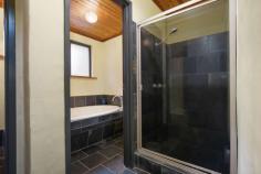 165 Translator Road Armidale NSW 2350 $1,350,000 Discover a peaceful and private rural paradise spanning 9.57 hectares, just a short 5-minute drive or bike ride from the CBD and airport. 'Applegum Ridge' is set on the fringe of the fast-growing town of Armidale, NSW. Armidale is located in the heart of the New England Region with easy access via road, rail, and air to metropolitan centres. Armidale is well-known for its proximity to world heritage national parks, excellent educational opportunities, including the University of New England and TAFE NSW Digital Hub. The main residence is a solar passive double brick building with four bedrooms, featuring built-in robes. The master bedroom comes with an ensuite, there is a three-way bathroom to service the other bedrooms. The living room boasts a soaring timber-clad vaulted ceiling and a cosy fireplace, while the kitchen combines country-style charm with modern appliances. The house is designed for solar passive heating in winter and cooling in summer, perfectly complementing the four-season garden. Outside, you can enjoy the landscaped garden, basalt stone walls, a waterfall, and a variety of deciduous trees, along with your very own olive grove. The property offers numerous entertaining areas with a patio and deck, providing great spots for relaxing with family & friends and enjoy the panoramic views. The property features four water tanks, a workshop/machinery shed, and well-maintained yards servicing six paddocks, suitable for horses and livestock enthusiasts. Additionally, there is a self-contained one-bedroom guest cottage that can be used as an office or extra accommodation. It features an open-plan kitchen, living, and dining area with new reverse-cycle a/c, as well as a bedroom, bathroom, and single carport. This tranquil retreat with sweeping rural views awaits your discovery. Don't miss your opportunity to own this 9.57ha rural paradise, offering both serenity and convenient town access.