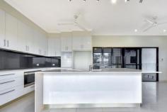 22 Duke St Stuart Park NT 0820 $1,400,000 This stunning property at 22 Duke Street in the highly desirable suburb of Stuart Park presents a rare opportunity to own a spacious and well-appointed family home in a prime location. With a gorgeous street presence, this multi-storey residence features a striking contemporary design that blends seamlessly with its city views. Step inside and be greeted by the inviting ambiance of the multiple living and dining areas, which flow out to an expansive outdoor entertaining deck with breathtaking views of the city lights from the large pool with waterfall. The gourmet kitchen is a highlight of the home, with modern appliances, ample storage and bench space, and a convenient breakfast bar for casual meals and a choice of indoor or outdoor formal dinning areas. With five generous bedrooms and three bathrooms, this home provides plenty of space for growing families. The master bedroom is a luxurious retreat situated the top floor with a lavish Ensuite, large walk in robe with views, complete with its own private balcony and enormous lounge area. Features: * Five bedrooms & three bathrooms over three levels * Spectacular master bedroom on the top floor with ensuite, built in robes & private balcony *The first floor contains kitchen and dining area, bathroom & two bedrooms * The ground floor contains 2 bedrooms, bathroom & the laundry with ample storage space * Beautifully appointed kitchen area with large island bench looking over the stunning view * Excellent outdoor entertaining area by the beautiful pool with fantastic views * Double lock up garage Located just minutes from the Darwin CBD, this home offers the perfect mix of peaceful residential living and city convenience, with easy access to local schools, shops, and public transport. Homes of this calibre in Stuart Park are highly sought after and rarely come to market - don't miss your chance to make this stunning property your own!