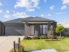 29 Noble Circuit Hackham SA 5163 $575,000 - $610,000 Completed in 2020, this exquisite four-bedroom home showcases contemporary designs, featuring a remarkably spacious and functional floorplan. The layout encompasses open plan living and dining areas, a family room with a dedicated study nook, and a generously proportioned outdoor entertainment space. Situated in a highly accommodating neighbourhood, in close proximity to local amenities such as shops and schools, this property presents an ideal opportunity for first home buyers, growing families, and investors alike. Upon entering the home, we are greeted by the stunning wooden flooring and expansive picture windows in every room with a warm and inviting ambiance. To the right, the beautiful master bedroom offers ample space for personal customisation. The master suite is equipped with a spacious and practical walk-in robe and ensuite, featuring a large walk-in shower, generous double vanity, and toilet. Bedrooms 2, 3, and 4 are all fitted with built in wardrobes for ample storage space. The floorplan is intelligently designed, with all bedrooms conveniently located in close proximity to the main bathroom and laundry facilities. The bathroom has a simplistic and chic aesthetic, with dark grey flooring complemented by white wall tiling, cabinetry, and fixtures. It includes a full-sized bathtub, walk-in shower, separate toilet, and ample cupboard space to meet all storage needs. The open plan living and dining area serves as an ideal space for entertaining, seamlessly connecting to the outdoor entertainment area through glass sliding doors. The kitchen is truly stunning, featuring an abundance of black cabinetry, complemented by grey benchtops topped with three pendant lights and a white herringbone splashback. High-quality appliances include a large 5-burner gas cooktop with a rangehood, InAlto oven and dishwasher, while offering ample space for a French door fridge or microwave, along with plenty of storage options. The family room provides a cosy setting for enjoying quality time with loved ones, whether snuggled up on the couch for a rainy-day movie or seeking a peaceful space for study away from the rest of the home. For optimal temperature control throughout the year, the residence is equipped with ducted reverse cycle heating and cooling. Beyond the impressive interior, the exterior of the home is equally captivating. The front facade showcases a charming charcoal brick exterior, complemented by well-maintained gardens, while a double garage ensures secure vehicle storage. Ample driveway space and side access are also available for additional off-street parking requirements. The outdoor entertainment area is truly delightful, featuring a pitched pergola that allows for comfortable gatherings with extended family and friends throughout the year. The entire property is enclosed by high-quality fencing, providing both security and privacy. Additionally, there is ample grass area for children and pets to enjoy. Located in close proximity to local schools, gym and shopping centres, this property is a true gem. In addition to its outstanding features, here are some highlights: Open plan living area Master bedroom with walk-in-robe and en-suite Multiple living areas Double garage Solar electrical system with two battery backup Wireless pop-up irrigation Side access Ducted reverse cycle heating and cooling Metricon Built 2020 Bedroom 2, 3, & 4 fitted with robes Pitch pergola Garden Shed