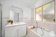 5 Charthouse Avenue Corlette NSW 2315 Situated in a quiet pocket in the family friendly suburb of Corlette and featuring a meticulously maintained façade, exuding a sense of tidiness and curb appeal, sits this ultimate single-level family home. Step inside and discover the epitome of comfort and modern living. The interiors are drenched in natural light which perfectly complements the calm colour palette and warm timber finish flooring to accentuate the spacious interiors. The layout flows seamlessly, with two distinct living areas that provide flexibility and space for various activities. The open-plan design enhances the sense of connectivity, allowing for easy interaction between the kitchen, dining, and living spaces. A sublime, contemporary kitchen fit with stainless steel appliances, crisp cabinetry, and an elegant island bench provides the ultimate space to entertain guests in a central hub. For those who love to entertain, the undercover entertainment area offers a picturesque setting to host gatherings, all while overlooking the expansive backyard. Boasting four generously sized bedrooms, each featuring built-in wardrobes and ducted air-conditioning, there's plenty of room for the whole family to reside in comfort while the two bathrooms, including an ensuite attached to the main bedroom, offer a perfect blend of original charm and cleanliness while you unwind after a long day. Situated in the peaceful enclave of Corlette, this home is a serene retreat from the bustling nature of everyday life, allowing you to relish the tranquillity of the surroundings. Experience the perfect blend of modern comforts and serene living in this exquisite property. Location, design, inclusions, functionality, luxury and quality - this home has it all and more! Approx. a 1km walk to Corlette Beach, there will be no excuses not to see the sunrise or sunsets.
