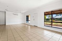 45 Godwit Crescent Djugun WA 6725 $565,000 Spread over a massive block on a family-friendly street in the ever-popular and desirable Roebuck Estate, this spacious 3 bed, 2 bath home delivers the features and flexibility every family is searching for. You're welcomed to the home by the lush front lawn and manicured tropical gardens. The carport offers undercover parking for one vehicle, with plenty of extra cracker dust driveway parking available for all of the toys. Another standout is the gated side access to additional secure parking at the rear or access to your future dream shed! Light and bright, the tiled interior boasts spacious open-plan living and dining areas with abundant natural light flowing through multiple big windows. The big corner kitchen comes complete with walk-in corner pantry, stainless steel appliances, tiled splashbacks, overhead and underbench cupboards, long breakfast bar and garden views. Other key features include the large main bathroom with separate shower and bath, huge separate laundry with built-in linen cupboards, modern downlights, air-conditioning, ceiling fans, window blinds, security screens and more! The rear bedroom zone is perfect for the kids with two large bedrooms, both with built-in robes, air-con and ceiling fans around the central main bathroom. Parents will love the peace and privacy of the spacious Master bedroom, complete with walk-in robe and private ensuite. Seamlessly blending indoor/outdoor living, near wrap-around verandahs offer year-round protection from the elements the paved undercover entertaining area is the perfect size for any party overlooking the huge rear yard. There's plenty of lush green grass for the kids and pets to play, a beautiful mature feature Boab tree, a large lockup storeroom with racking for all your tools and toys and more than enough room to sink a pool. Tucked away in a quiet loop close to parks, schools, Cable Beach and just a 5-minute drive from Chinatown, this is the modern, low-maintenance family home you've been searching for.