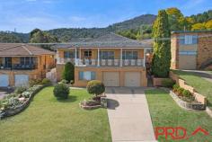6 Nurraba Street Tamworth NSW 2340 Set in East Tamworth, one of the most highly sought after areas, you will find this stunning brick home with breathtaking views. If seclusion and a peaceful lifestyle is important to you, then you simply must inspect this beautiful family home. Situated on a 632sqm block, with a fully secured yard that backs onto the reserve. Featuring 3 generous sized bedrooms each complete with walk in wardrobes and a spacious main bathroom with a separate toilet. Boasting a well-appointed kitchen with ample storage, a spacious living area and formal dining room that has been well positioned to take advantage of the stunning views. The home offers a study which leads to the spiral staircase taking you down to an additional entertaining space with a bar area and waterfall, as well as another office space. Other features include an extra large garage, additional workshop area and under house storage, a generous back patio with a built in BBQ area, perfect for entertaining guests or relaxing with family and an incredible front verandah where you can soak in the amazing views.