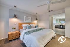 20 Oakview Blvd Narre Warren North VIC 3804 $1,750,000 - $1,800,000 Situated in an exclusive tree-fringed boulevard at the highly sought-after Oaktree Rise Estate, number 20 Oakview Boulevard projects a commanding presence from its wide-fronted 884m², elevated setting. Of immediate attraction is its superb three-car garage with drive-through access for further vehicle storage. A wide, exposed aggregate parking apron permits ample family or guest parking too. Step inside and a wonderful light-filled and spacious interior beckons. Features include an independent lounge with stunning views across the adjacent wetlands, a fully fitted and beautifully functional home office/study with a downstairs powder room adjoining the family-sized laundry. A fully equipped theatre lounge is also featured, it includes chic window shutters and an acoustic ceiling panel with starry light board effects - a living room with appeal both day & night! Perhaps the most alluring aspect of the home is the kitchen and surrounds, featuring twin ovens, stone benches, a walk-in pantry/scullery, and an enormous full-length bench extending into the dining zone, making it an ideal space for casual family gatherings or serious culinary exercises - Flowing seamlessly to the outdoors as you step out through sliding stacker doors to the alfresco deck. A large, paved area is then joined by the fabulous heated inground swimming pool in a fully fenced enclosure. Low maintenance and hassle-free it’s sure to be a focus of outdoor life this summer! Upstairs there is the family retreat with a private balcony and a total of four double bedrooms. The generous master suite enjoys fabulous views and features his and her walk-in robes and a beautifully appointed ensuite. Storage is not an issue with all remaining rooms complete with walk-in robes, one provides a great option for guests or larger families with its own private ensuite. Relish the harmony of suburban living while remaining well-connected to urban amenities. Excellent schools, parks, shopping, and dining options are just a stone's throw away. Properties in this location never last long! Don't miss the opportunity to make this stunning home your own and embark on a new chapter of luxury living.