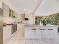 27 Allara Street Flaxton QLD 4560 $975,000 Perched at the end of a stunning tree-lined and serenely tranquil cul-de-sac is the beautiful 27 Allara Street, Flaxton. Set upon a gorgeous 2.2-acre parcel of land, this remarkable property offers a sense of serenity and grandeur, with captivating views overlooking a magnificent spring-fed dam. Step inside the single-level brick home and be greeted by a harmonious blend of character and modern allure. Boasting four spacious bedrooms, including a master retreat complete with an ensuite and a walk-in robe, this home exudes both charm and functionality. The layout has been thoughtfully designed with the modern family in mind, ensuring optimal separation and privacy for every resident. Prepare to be inspired in the expansive, modern kitchen adorned with stone benchtops, an inviting island bench, a walk-in pantry, and a gas cooktop. As you craft your culinary creations, let your gaze wander across the stunning backdrop of rolling green hills and the mesmerising dam, transforming every cooking experience into a work of art. Unwind and immerse yourself in the spacious lounge room, where you can indulge in your favourite series or movie. The added touch of a cosy fireplace sets the perfect mood for relaxation and blissful moments of tranquillity. Embracing sustainable living, this property is fully self-sufficient, featuring a 5kW solar power system, solar heating, and two generously sized water tanks. An efficient irrigation system is seamlessly connected throughout the property, drawing from the dam to keep the gardens vibrant and thriving. Situated just a few minutes' drive from the charming Montville and Mapleton Villages, and a mere 30 minutes from the breathtaking northern beaches, Flaxton offers the epitome of affordable acreage living. Here, you can enjoy the best of both worlds-an idyllic countryside lifestyle complemented by convenient access to modern amenities.