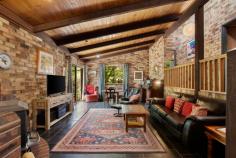 165 Translator Road Armidale NSW 2350 $1,350,000 Discover a peaceful and private rural paradise spanning 9.57 hectares, just a short 5-minute drive or bike ride from the CBD and airport. 'Applegum Ridge' is set on the fringe of the fast-growing town of Armidale, NSW. Armidale is located in the heart of the New England Region with easy access via road, rail, and air to metropolitan centres. Armidale is well-known for its proximity to world heritage national parks, excellent educational opportunities, including the University of New England and TAFE NSW Digital Hub. The main residence is a solar passive double brick building with four bedrooms, featuring built-in robes. The master bedroom comes with an ensuite, there is a three-way bathroom to service the other bedrooms. The living room boasts a soaring timber-clad vaulted ceiling and a cosy fireplace, while the kitchen combines country-style charm with modern appliances. The house is designed for solar passive heating in winter and cooling in summer, perfectly complementing the four-season garden. Outside, you can enjoy the landscaped garden, basalt stone walls, a waterfall, and a variety of deciduous trees, along with your very own olive grove. The property offers numerous entertaining areas with a patio and deck, providing great spots for relaxing with family & friends and enjoy the panoramic views. The property features four water tanks, a workshop/machinery shed, and well-maintained yards servicing six paddocks, suitable for horses and livestock enthusiasts. Additionally, there is a self-contained one-bedroom guest cottage that can be used as an office or extra accommodation. It features an open-plan kitchen, living, and dining area with new reverse-cycle a/c, as well as a bedroom, bathroom, and single carport. This tranquil retreat with sweeping rural views awaits your discovery. Don't miss your opportunity to own this 9.57ha rural paradise, offering both serenity and convenient town access.