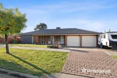 5 Fraser Court Wodonga VIC 3690 $670,000 If you’re looking for a beautifully updated family home, in a great location with absolutely nothing to do, then 5 Fraser Court will instantly appeal! An absolute pleasure to offer for sale, with perfect presentation and set on a secure and beautifully maintained allotment with low maintenance gardens, this home has a host of beautiful appointments and features throughout. Consisting of four bedrooms all with built in robes and ceiling fans, the main bedrooms also offers a bay window and beautifully updated ensuite with twin vanities. Both formal and informal living areas with the option of the existing dining room being utilised as a study, with the meals area positioned adjacent to the kitchen. The chef at heart will love the updated kitchen with beautiful benchtops, stainless steel appliances, great storage, and a walk-in-pantry. Whilst the family bathroom has also been updated with a stylish bath and vanity. Stylish décor throughout, and beautiful floating floors add to the appeal of this gorgeous home. Rest assured, you will remain comfortable year-round with ducted gas heating and ducted evaporative cooling throughout. Stepping out of the family room you will love the 4.8 x 8.9m enclosed entertaining area with tiled floor, ceiling fans, drop down blinds and a wood heater – a great place to sit and relax or to entertain at family gatherings! There are plenty of vehicle accommodation options, with a double carport with secure roller doors, as well as a separate secure undercover port for the boat, trailer, or smaller van. Adding to all on offer is the 6 x 9m powered shed with concrete floor and insulated walls and ceiling – an ideal workshop, garage or for use as additional storage. A 6.6 kW Solar System with 20 panels to ensure your power bills are kept to a minimum. Relax and unwind in the covered spa in the backyard, and there is also 2 lockable garden sheds and immaculate gardens on offer.