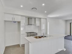 33 Sierra Dr Ipswich QLD 4300 $700,000 Promising to capture the attention of families, investors and entry-level buyers alike, this dual-level property is just a stone’s throw from Orion Springfield Central’s conveniences and the magnificent Whites Rock Spring Mountain Conservation Estate. Also close to esteemed schools and Robelle Domain’s popular parklands, this exceptional residence boasts immaculate interiors and a picturesque outlook. Situated adjacent to verdant greenspace, the home features a classic facade, established gardens and an elevated aspect. Inside, sleek tiled and carpeted floors are complemented by a calming neutral colour palette. Forming the heart of the property, a spacious open-plan living and dining area is situated on the residence’s upper level. Capturing wonderful natural light, this impeccable central space spills out onto a covered front balcony commanding leafy views. Here, share an al fresco meal, toast the sunset or simply unwind with your morning coffee and admire the delightful vista. Finishing the central living area, a sensational kitchen displays stone benchtops, stainless-steel appliances and ample cupboard storage. You will also find an ensuited master bedroom showcasing a walk-in robe and a private balcony. Three additional bedrooms encompassing built-in robes are serviced by a well-appointed main bathroom, which has a separate bath, shower and toilet. Complete with a secure dual garage and a fully-fenced grassed rear yard on the ground level, the home also includes an internal laundry, superb storage, ducted air-conditioning and ceiling fans. Minutes from a slew of shops and dining options, this fantastic property is near the city-bound Centenary Highway, the Springfield Central train station and White Rock Spring Mountain Conservation Estate’s walking tracks. Falling within the Spring Mountain State School and Springfield Central State High School catchment areas, this outstanding residence is also a short drive from Saint Peters Springfield, Good Shepherd Catholic Primary School and The Springfield Anglican College. The University of Southern Queensland’s Springfield campus is easily accessible from this address, as well.