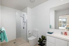508 / 6 Bullecourt Street Shoal Bay NSW 2315 Nestled within the highly sought-after 'The Shoal' complex, this contemporary apartment boasts an optimal north facing orientation. Situated just a street back from the renowned Shoal Bay Beach - one of Australia's most prized coastal gems on the east coast. Radiating a sense of coastal opulence, this flawlessly maintained apartment offers two spacious rooms of accommodations two bathrooms, polished timber flooring, a well-equipped kitchen with premium appliances, two exquisite bathrooms, inducted air conditioning, and the added benefit of a secure undercover parking space. Lift access directly from the carpark to your front door will making living here a breeze whilst the north aspect will flood the property with natural light throughout the day. Property features: • Two bedrooms equipped with built-in robes • Two bathrooms including ensuite to main bedroom • Quality kitchen with stone benchtops and quality appliances • Open plan kitchen, dining & living area • Ducted Air conditioning • North facing aspect • Dual balconies • Secure undercover parking