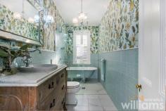 23 Alexandra St Drummoyne NSW 2047 $4,950,000 A rare opportunity to own a beautiful heritage home full of charm in one of East Drummoyne's finest streets. Set on over 700sqm of land, families of all ages will fall in love with this spacious four-bedroom property that features a stunning, resort-style pool and delightful landscaped gardens. Thoughtfully renovated with style and panache, great care has been taken to blend contemporary accents with the property's period features. At the heart of the home is a relaxed lounge, complete with wood burning fire, that flows to a huge, covered deck overlooking the pool. On the upper level is light-filled parents' retreat with dual walk-in robes, designer ensuite, and Juliet balcony with garden outlook. Located in a leafy and picturesque street, only 300m to waterfront parks, 600m to Birkenhead Retail, and 350m to express CBD buses. • Charming and elegant four-bedroom family home in a prized address • Three generously sized guest bedrooms, with plantation blinds and period features • Formal lounge featuring original fireplace, custom built bookshelves, picture rails • Upper-level master suite offers dual walk-in robes, en-suite, balcony and air con • French provincial style lower-level bathroom with claw-foot bath and timber vanity • Casual lounge including custom-built cabinetry, wood burner, double doors to deck • Large gas kitchen with plenty of storage and Miele dishwasher. Internal laundry • Covered, elevated timber deck with ample room for BBQ, lounges, and dining set • Resort-style in-ground swimming pool includes area for sun-loungers • Landscaped gardens • Timber flooring throughout. Original period features including picture rails and fireplaces • Under-house wine cellar. Internal courtyard • Double lock-up garage plus carport with remote doors, workshop space, access from rear laneway