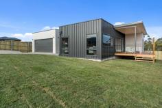 10 Dominique Way Rokeby TAS 7019 $760,000 Constructed by one of Hobart's premium builders, Elevate Building Tasmania, widely known within the construction industry for their exceptional build quality and impressive finishes, this stunning brand new 3-bedroom, 2-bathroom home is sure to impress. Offering quality at every turn, flawless presentation from start to finish, with high-end fixtures throughout, this lavish home awaits its lucky owner! The open plan living and dining area with timber floating floors that flow seamlessly throughout sun-soaked interiors and inviting neutral décor, bathes in light and warmth. The area comprises of a beautiful kitchen that has been generously appointed with sleek black appliances and stone bench tops making entertaining for friends and family a must. The living area creates a smooth connection between indoor and outdoor entertaining by providing access to the timber deck, perfect for summertime. The master suite has generous proportions, large walk-in robe, and beautiful floor to ceiling tiled ensuite. The master bathroom is spacious and features an integrated bath and an attractive floor to ceiling concrete fusion steel tiles as well as matt black tapware. The property boasts two further generous size bedrooms with built in robes. The home is within a short distance from the new Glebe Hill Village development, which is one of Eastern Shore's most convenient shopping destinations. Along with a Coles supermarket, post office, McDonalds, the village is complemented by a diverse tenancy mix targeted at meeting your weekly shopping needs including restaurants, bakery, pharmacy, post office, hairdressers, and beauticians.