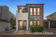 Unit 4/15 Hythe St Ridleyton SA 5008 $675,000 - $725,000 Going about its quiet business on a cobbled no-through lane, this bluestone-fronted 3-bedroom townhouse takes the ease of executive-style living and wraps it up in a deceptively spacious package that implores you to lock up, leave and love the lifestyle it affords in a sleepy, near-city suburb on the rise. Allocating a lock-up garage, multiple living zones and an alfresco entertainer’s patio to its ground level footprint, spread out and step out with ease from this light-filled home with a supremely functional open-plan kitchen and a lane-facing lounge room that could be an office, theatre room or another bedroom. Rest easy on an upper level with three bedrooms, including a primary with its own terrace balcony. Sleep well, rise ready to enjoy the perks of living just a stroll from parks/reserves and a short pedal from Croydon’s Queen Street cafes, Bowden’s uber hip Plant 4 and the CBD beyond. Just lock up and love it. Features to love: • Flexible floorplan with spacious open-plan living • Super-functional kitchen with gas cooktop and dishwasher • Study nook to upper level • Loads of storage, including built-in robes to all bedrooms • Ducted reverse cycle heating and cooling • Stylish timber-look floors to lower floor • High ceilings • Separate laundry and guest toilet to lower level • Ultra low-care landscaped gardens • Remote entry and rear roller door to lock-up garage • Off-street parking for at least two cars • Ready to reside in or rent out from day one • Zoned for Brompton Primary and Woodville High Schools • A short drive from North Adelaide, Adelaide Oval • A stroll from the Excelsior Hotel • Walking distance from public transport