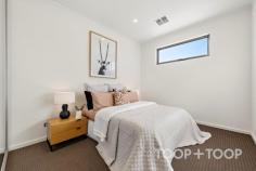 5A Allington Ave Marleston SA 5033 $745,000 - $775,000 Welcome to 5A Allington Avenue, a modern townhouse that exudes warmth, style, and convenience. This property is a testament to meticulous attention to detail and high-quality finishings, creating a home that is both inviting and luxurious. Nestled between the city and the sea, this 3-bedroom, 2.5-bathroom, dual-storey home offers the perfect balance of both worlds. The upper level of the home is fully carpeted, creating a cozy and comfortable atmosphere. The main bedroom is a haven of tranquility, featuring a walk-in wardrobe and a private ensuite. The two additional spacious bedrooms are equipped with floor-to-ceiling mirrored built-in-robes and large windows that flood the rooms with natural light. A cozy study nook completes the upstairs, providing a quiet space for work or study. The lower level of the home featuring spotted gum timber floors, boasts an open-concept plan that is perfect for both entertaining and everyday living. The kitchen is a chef's dream, featuring high-end stainless-steel appliances, a gas stove, sleek white cabinetry, and a large island with a breakfast bar. The stylish backsplash and stone countertops add a touch of modern elegance to the space. The open-plan living area seamlessly transitions to the fully tiled outdoor alfresco area through glass sliding doors. This outdoor space is equipped with downlights and a ceiling fan, ensuring comfort during those warm summer evenings. The spacious double car garage with internal access ensures parking is always a breeze. This one owner-occupied property provides easy access to shopping centres, parks, reserves, and recreational facilities. Zoned for Plympton International College and close to other reputable schools, including Black Forest & Plympton Primary, this property is perfect for families. With nearby amenities such as Kurralta Park Central, Terry White Chemmart, and the delicious Karma and Crow Café. Everything you need is within reach! Property Features; • 2.7m ceiling • Three bedrooms, two-and-a-half bathrooms • Open plan kitchen, dining, and family room • Spotted Gum timber floors • Main bedroom with walk-in robe and ensuite • Study nook located upstairs • Downstairs toilet & powder room • Double car garage with secure internal access • Reverse cycle ducted A/C throughout for year-round comfort • Short walk to the West Torrens dog park and Weigall Oval Tennis Courts • Low maintenance landscaping • 10-minute drive to Glenelg • 6km to Adelaide CBD
