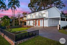 13 Cromarty Road Soldiers Point NSW 2317 Delivering a commanding street appeal, this impeccably transformed residence delivers a low maintenance, high-end sanctuary for both families and downsizers, offering unbeatable comfort and sophistication with a prestigious beachside address. Situated a mere 150m to the glistening water of Sunset Beach and renovated to the highest standard, there is absolutely nothing left for you to do except turn the key, move in and start enjoying your dream lifestyle. Cleverly designed to deliver a striking coastal home, the upper-level comprises a vast open plan living & dining area enhanced by quality timber flooring and a seamless transition to a sun bathed balcony perfect for enjoying breezy afternoons with family and friends as you admire the water views on offer not to mention the most stunning Sunsets. An additional living area downstairs makes the perfect retreat for the kids and means you never have to compromise on space! The gourmet kitchen is equipped with a quality stone benchtop, premium induction cooktop, LED feature lighting & breakfast bar which is finalised by shaker style cabinetry for a sleek, modern look. Accommodation is comprised of four generously proportioned bedrooms including a master suite with a walk-in wardrobe & ensuite bathroom. Featuring split system air-conditioning, skylights, water views, energy saving LED lighting throughout, immaculate landscaping with watering system, single garage plus an extra carport- this residence is sure to impress! Spend your mornings walking along the beach or enjoy listening to the sound of birdsong as you walk down to local cafes to grab a coffee or a delicious meal!